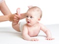 Baby massage. Mother massaging kids legs