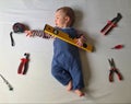 Baby with mechanic tools Royalty Free Stock Photo