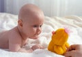 Baby meet with a toy Royalty Free Stock Photo