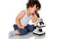Baby with microscope. Royalty Free Stock Photo
