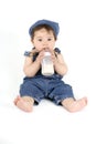 Baby with a milk bottle Royalty Free Stock Photo