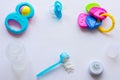 Baby milk powder, baby bottle and children`s toys on a light background flat lay Royalty Free Stock Photo