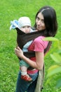 Baby with mom in baby carrier