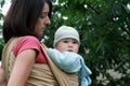 Baby with mom in sling