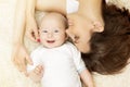 Baby and Mother, Happy Mom with six months Kid Boy, top view Royalty Free Stock Photo