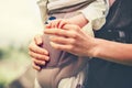 Baby and mother holding hands embracing Royalty Free Stock Photo