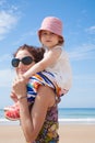 Baby on mother shoulders Royalty Free Stock Photo