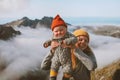 Baby and mother traveling outdoor happy family hiking in mountains Royalty Free Stock Photo