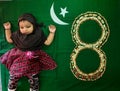 Baby in Muslim getup weared a Hijab for Ramzan festival decorated with dry fruits