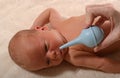 Baby and nasal aspirator Royalty Free Stock Photo
