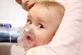 Baby with nebulizer mask Royalty Free Stock Photo