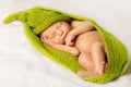 Baby New Born Sleep, Sleeping Newborn Kid Wrapped in Green Royalty Free Stock Photo