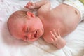 Baby or newborn is crying and suffers from colic Royalty Free Stock Photo