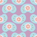 Baby pacifier seamless pattern on purple background.