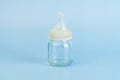 Baby pacifier on the small bottle Royalty Free Stock Photo