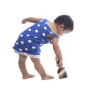 Baby painting color brush on floor isolated white background