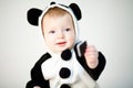 Baby in panda costume