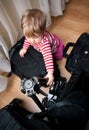 Baby with photography gear