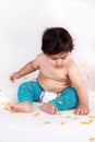 Baby picking goldfish