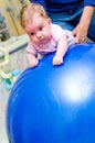 Baby on pilates ball Royalty Free Stock Photo