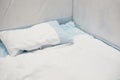 Baby pillow bed and bumper in white and blue tone Royalty Free Stock Photo