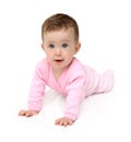 Baby in pink on white sheet Royalty Free Stock Photo