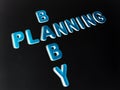 baby planning text written on english language with dark abstract Royalty Free Stock Photo