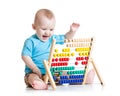 Baby playing with abacus toy Royalty Free Stock Photo