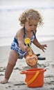 Baby playing at beach