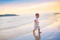 Baby playing on beach. Children play at sea Royalty Free Stock Photo