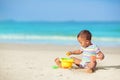 Baby playing on beach. Children play at sea Royalty Free Stock Photo