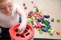 Baby playing with blocks and sorting shapes