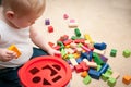 Baby playing with blocks and sorting shapes