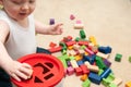 Baby playing with blocks and sorting shapes