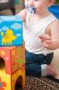 Baby playing with blocks