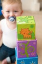 Baby playing with blocks