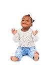 Baby, playing and clapping with smile in studio for applause, fun and cheerful on white background. Child, learning and