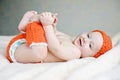 Baby playing with legs Royalty Free Stock Photo