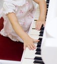 Baby playing on piano