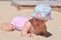 Baby playing in the sand