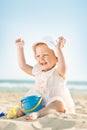 Baby playing at the sea