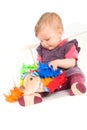 Baby playing with soft toy Royalty Free Stock Photo