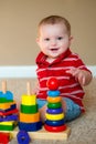 Baby playing with stacking learning toy Royalty Free Stock Photo