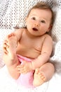 Baby playing with toes Royalty Free Stock Photo