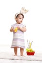 Baby playing with toy chicken Royalty Free Stock Photo