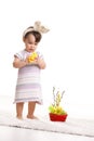 Baby playing with toy chicken Royalty Free Stock Photo