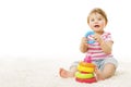 Baby Playing Toy Rings, Infant Child with Colorful Pyramid Royalty Free Stock Photo