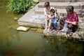 Baby playing at the waterside Royalty Free Stock Photo