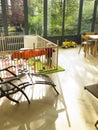 Baby in Playpen in Living Room