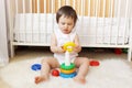 Baby plays nesting blocks